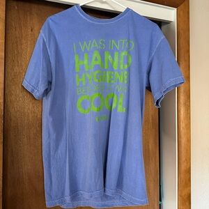 Blue T-Shirt with Green Text